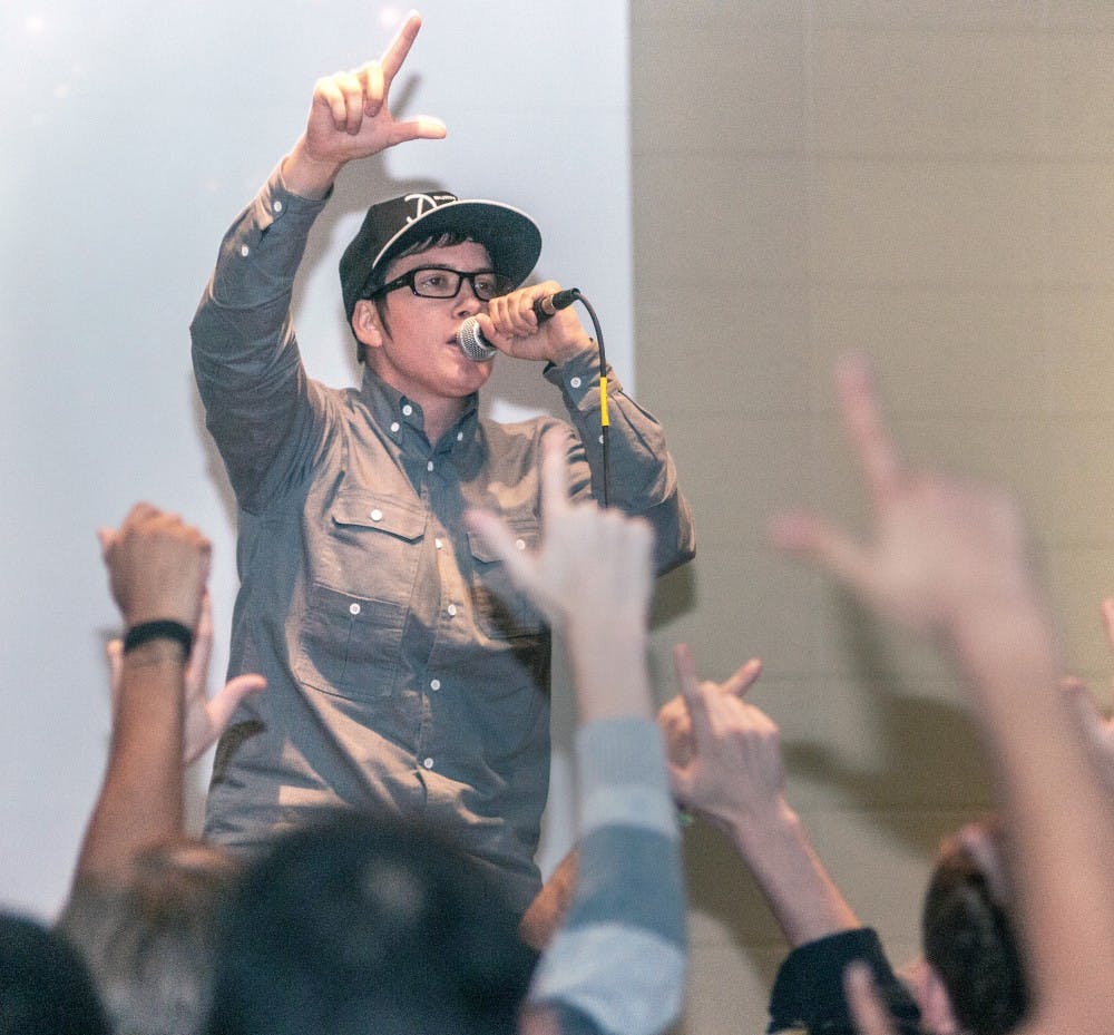 	<p>Detroit-based Hip Hop artist Invincible performs for a crowd of <span class="caps">LGBT</span> supporters Friday night, Sept. 28, 2012 at the Erickson Kiva. Invincible, a <span class="caps">LGBT</span> activist herself came to show support for the cause on <span class="caps">MSU</span>&#8217;s campus. Adam Toolin/The State News</p>