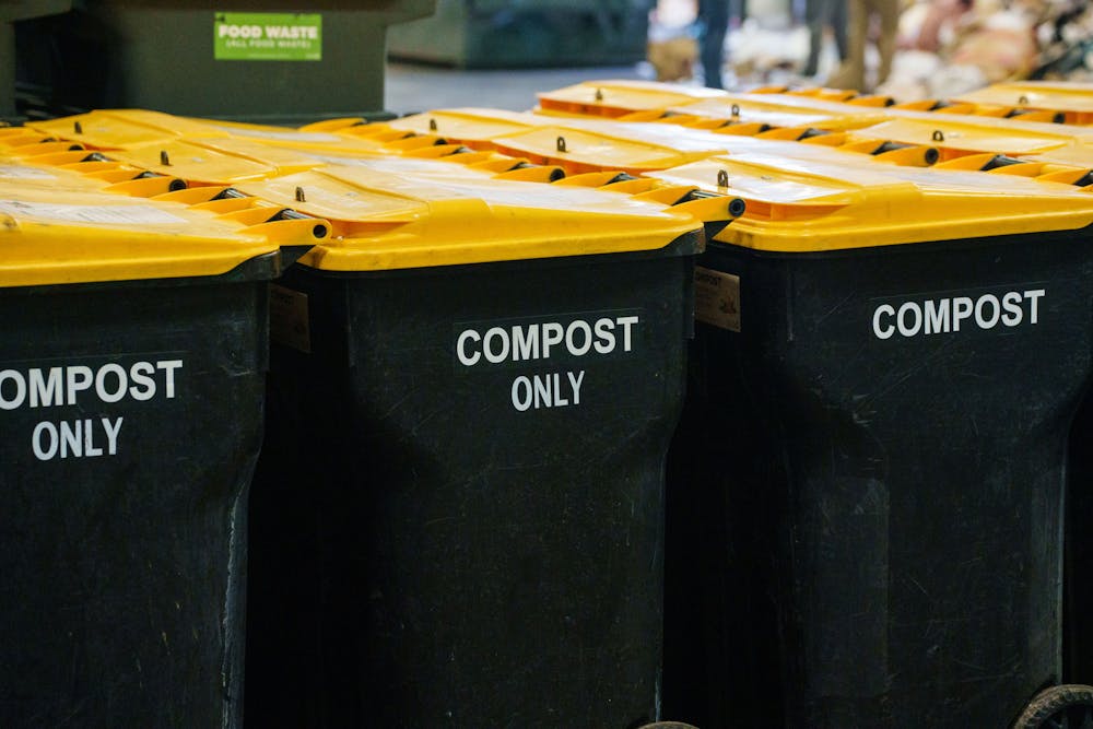 Garbage bins in the MSU Recycling Center labeled "Compost Only" collect food waste to be used to make compost soil, photographed on April 3, 2023.