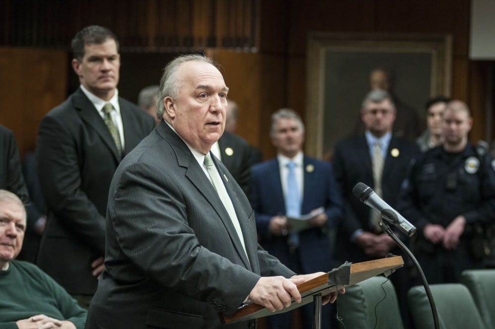 Newly appointed interim president John Engler addresses the media on Jan. 31, 2018, at Hannah Administration Building. (C.J. Weiss | The State News)