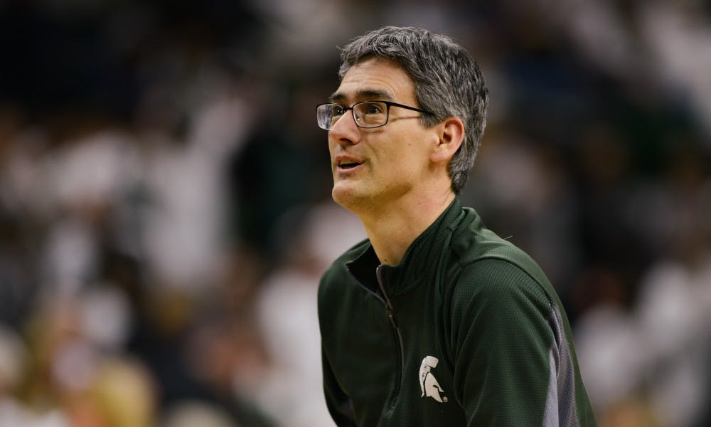 Dr. Eric Larson of Grand Rapids shoots free throws during the final round of Michigan State Basketball's free throw competition March 9, 2019. He came in 2nd place. Larson's son died in a car accident last August.