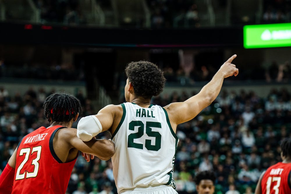 <p>Senior forward Malik Hall (25) gives a hand signal to one of his teammates on Feb. 7, 2023. The Spartans defeated the Terps with a score of 63-58.</p>