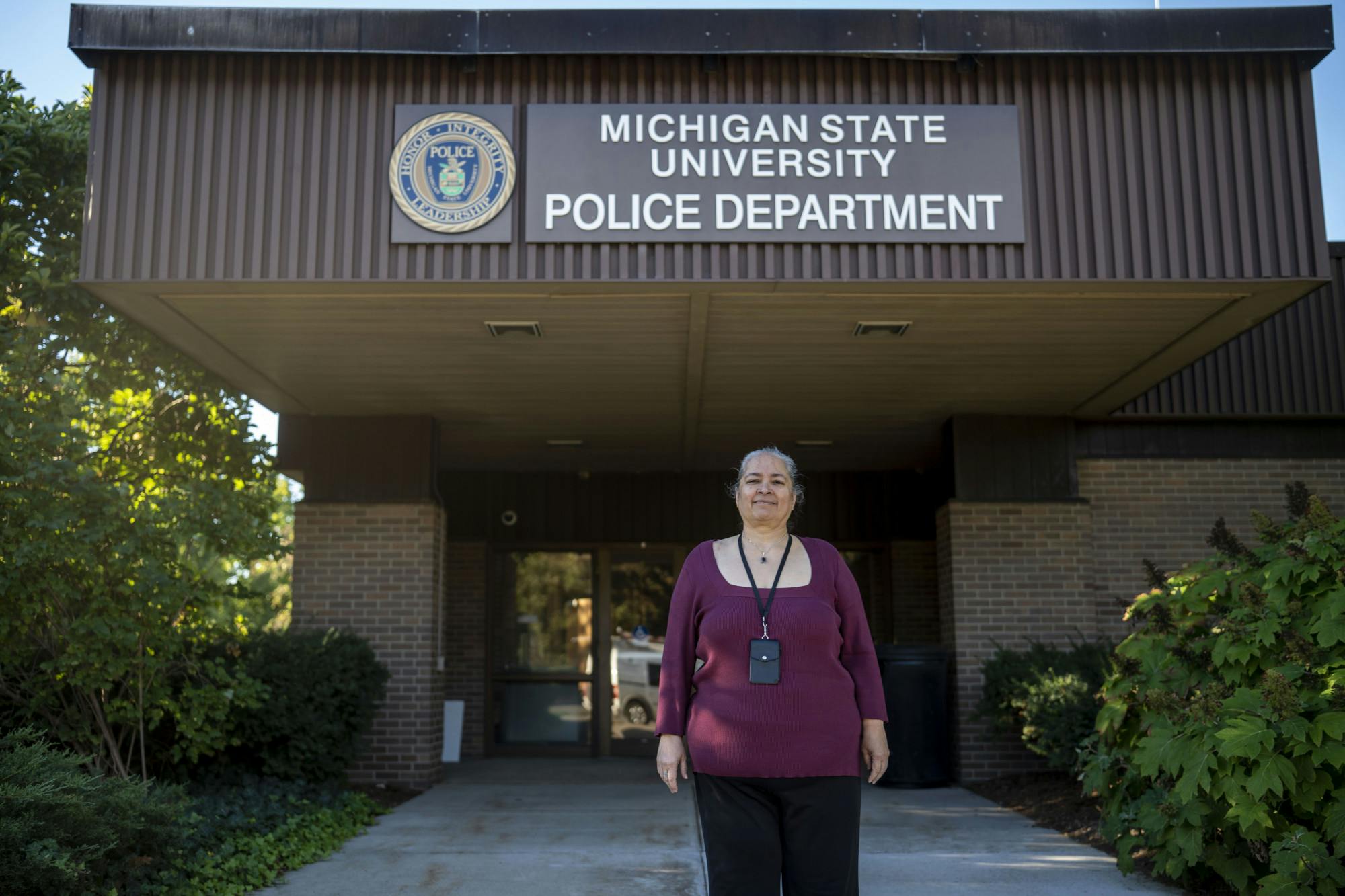 <p>Maria poses for a photo at the MSU Police Station at 1120 Red Cedar Rd on Sept. 23, 2022. Valayil is the new Police Social Worker and her position is to assist officers with mental health emergencies and provide support services and coordinate with community partners.</p>