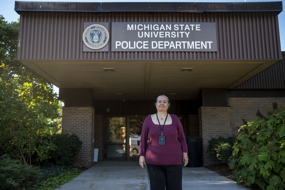 <p>Maria poses for a photo at the MSU Police Station at 1120 Red Cedar Rd on Sept. 23, 2022. Valayil is the new Police Social Worker and her position is to assist officers with mental health emergencies and provide support services and coordinate with community partners.</p>