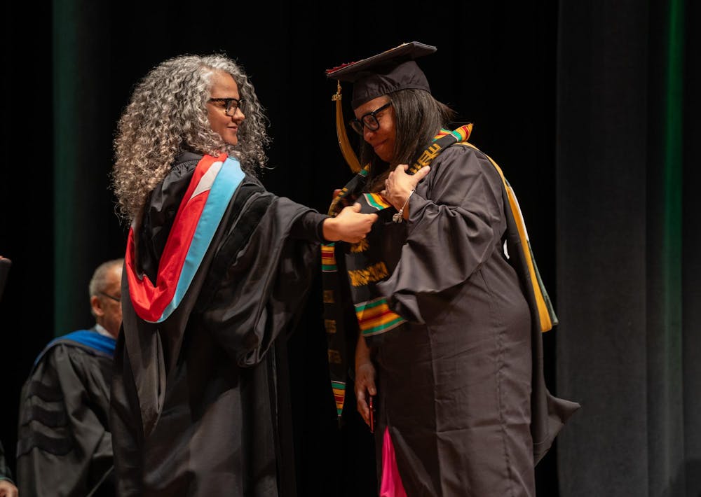 Michigan State students receive their stoles during the Black Graduation ceremony at the Wharton Center on April 21, 2024.