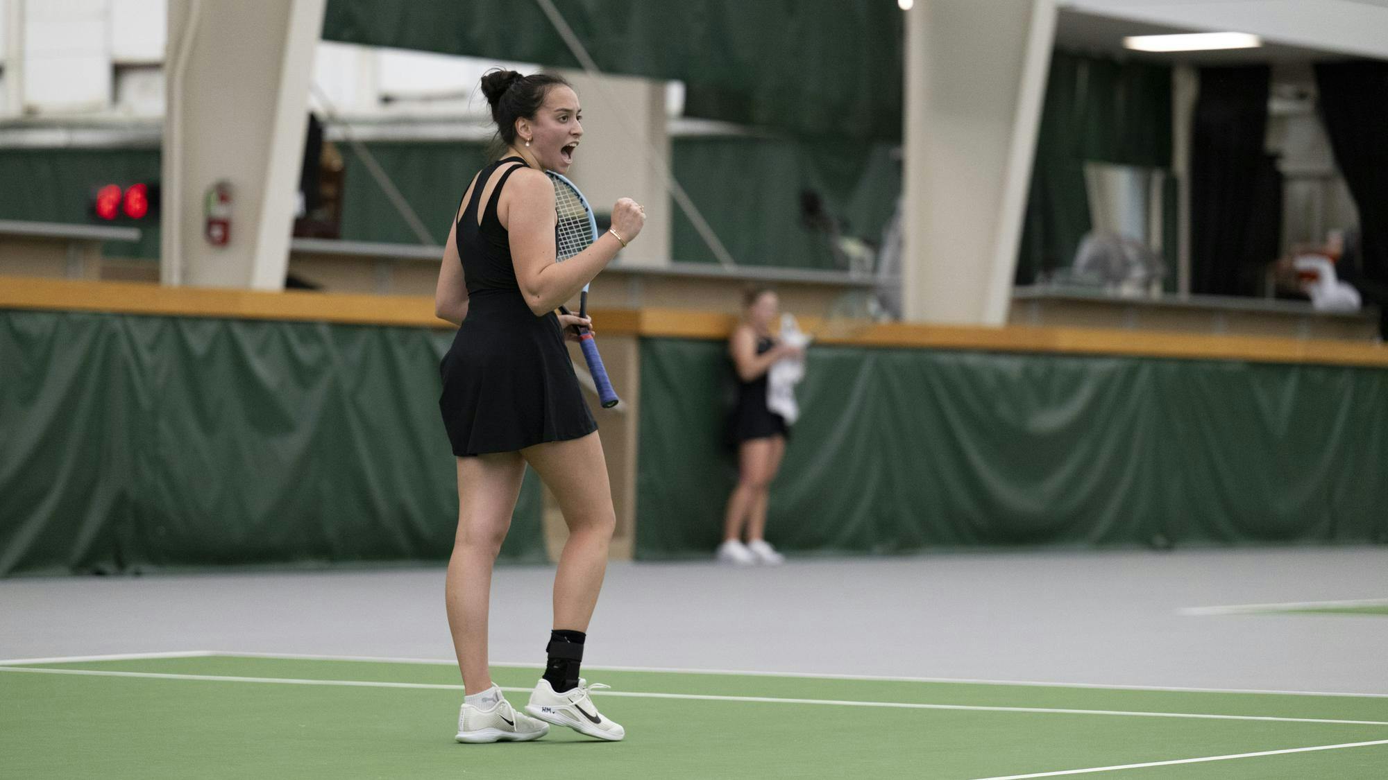 Amara Brahmbhatt, a sophomore for Maryland, celebrates after winning a point against Oliwia Orlinska at the MSU Tennis Complex on Sunday, April 12, 2026.