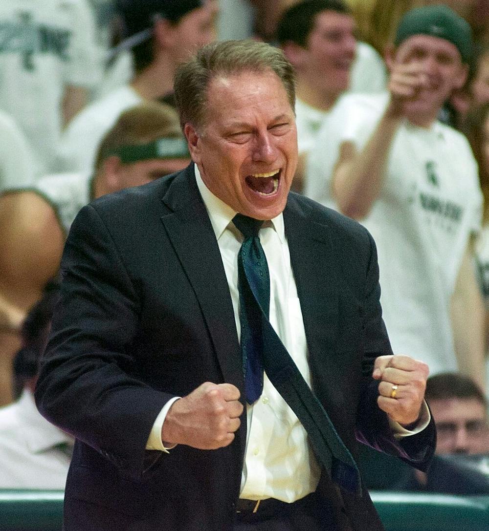 <p>Head coach Tom Izzo reacts to senior guard/forward Branden Dawson making both of his free throws Feb. 14, 2015, during the game against Ohio State at Breslin Center. The Spartans defeated the Buckeyes, 59-56. Erin Hampton /The State News</p>