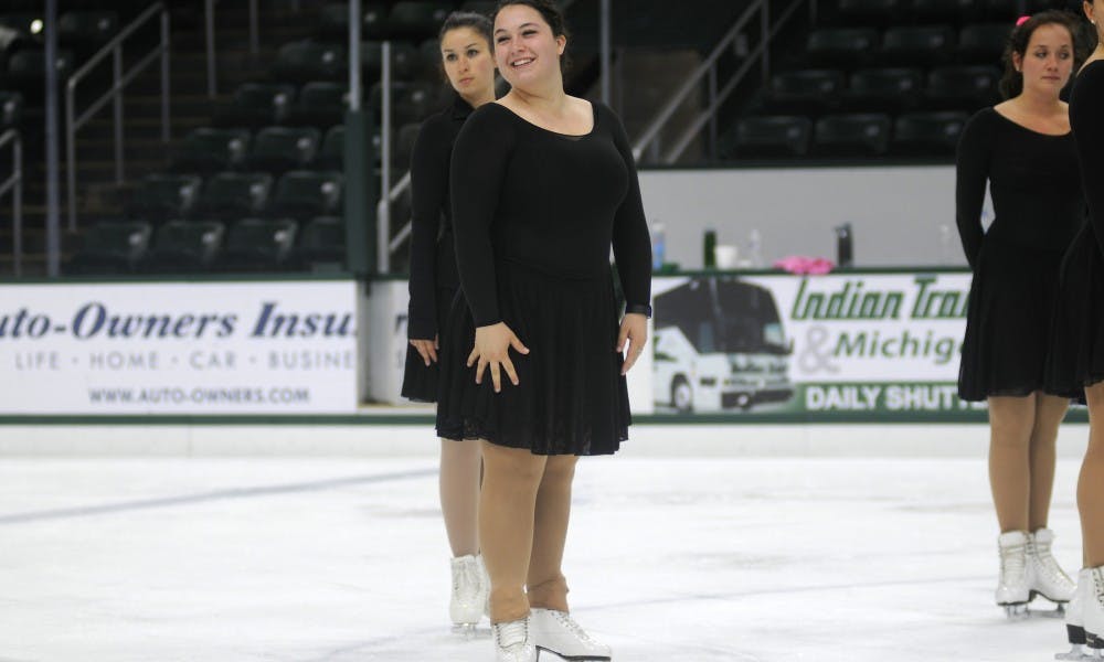 <p>Anthropology junior Katelyn Dalla Valle stands, ready to run a routine, during practice with the Michigan State University Synchronized Skating Team on Oct. 12, 2015, at Munn Ice Arena.</p>