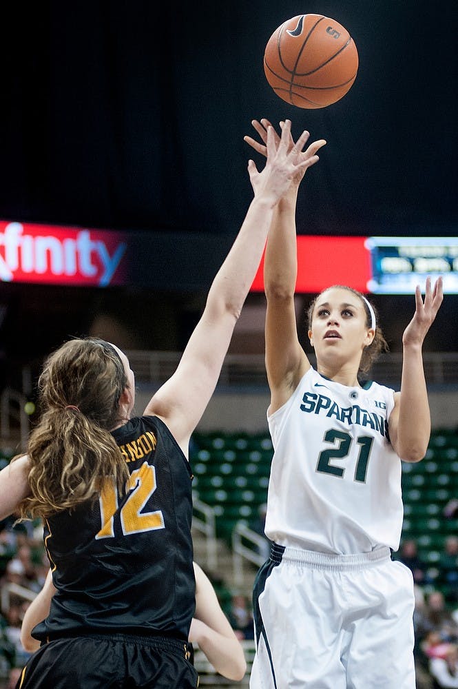 	<p>Junior guard Klarissa Bell makes a field goal attempt as Iowa center Morgan Johnson defends in the second half of the game. Bell scored 25 points during the game. The Spartans defeated the Hawkeyes, 65-54, Thursday, Jan. 17, 2013, at Breslin Center. Justin wan/The State News</p>