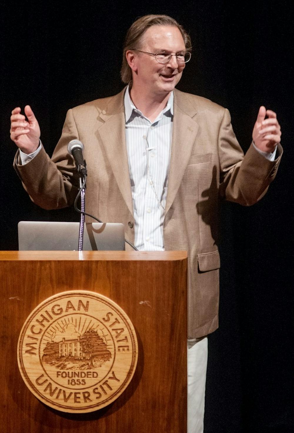 Nobel Laureate Jack Szostak speaks to the audience Thursday evening, July 19, 2012 at the Wharton Center.  Szostak spoke to the Artificial Life 13, international conference crowd on the topics of the simulation and synthesis of living things. Adam Toolin/The State News