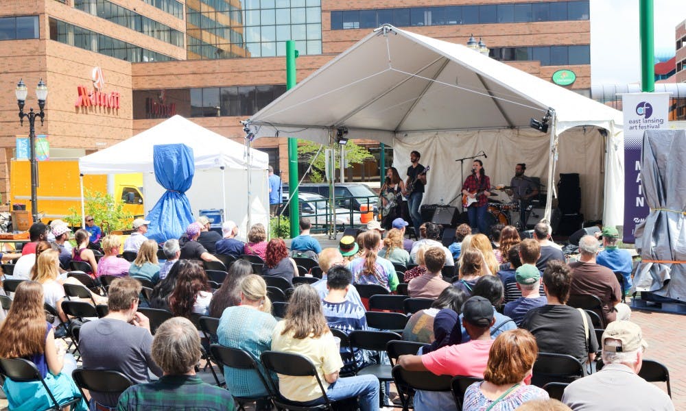 <p>Crane Wives perform during the East Lansing Art Festival on May 21, 2017. Crane Wives is a four-piece Americana/folk band founded in Grand Rapids, Michigan in 2010. When the guitarist and singer in Crane Wives Katt Pillsbury talks about how the band survive 7 years after college, she said, "If you have the passion and you have the diligence, it will work out, it just takes time." The East Lansing Art Festival is an event meant to bring the East Lansing community together through appreciation of art.</p>