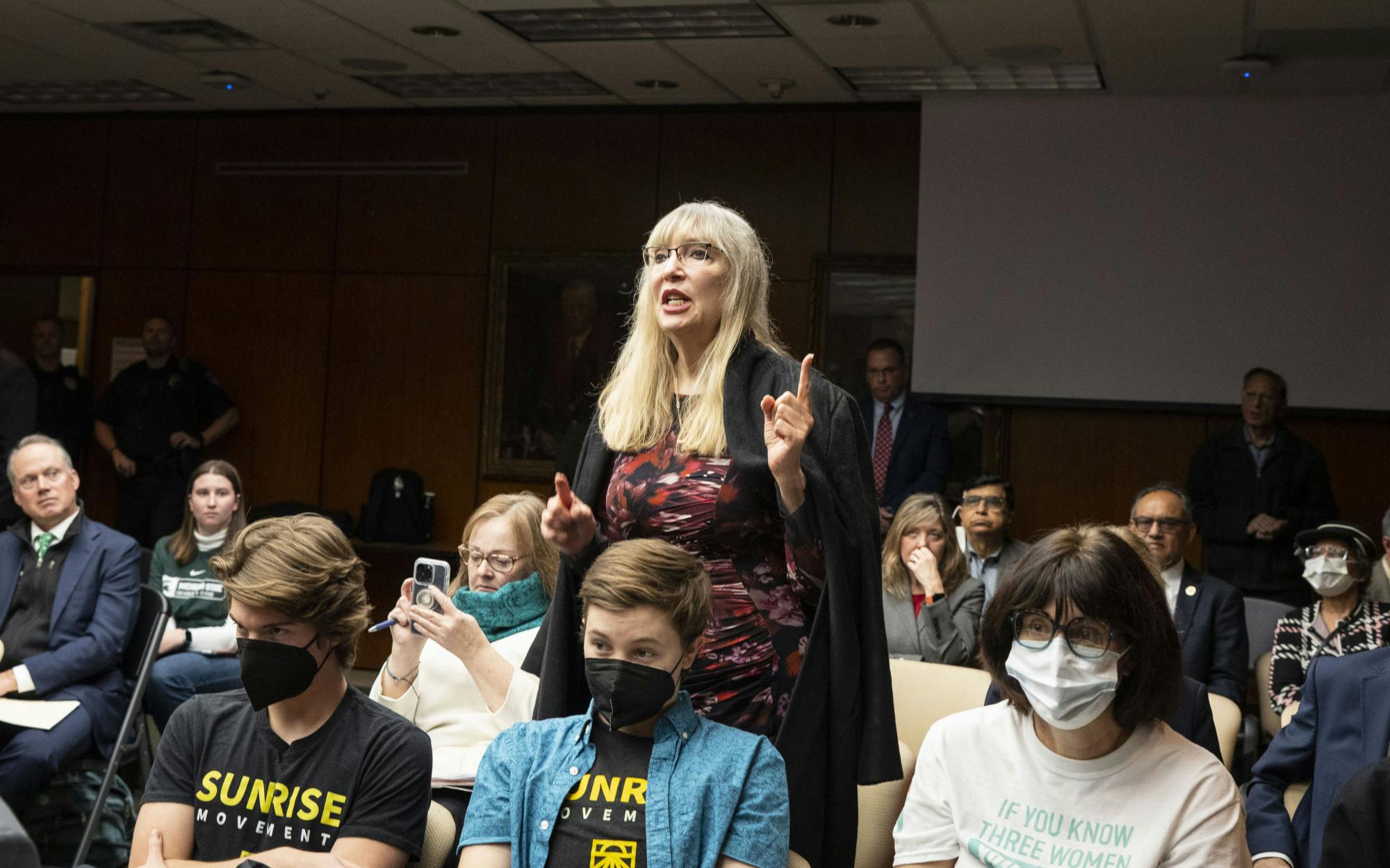 <p>Professor Shawnee Vickery stands to the Board of Trustees during their meeting on Friday, Dec. 16, 2022 at the Hannah Administration Building for their reception honoring former president Lou Anna K. Simon. </p>