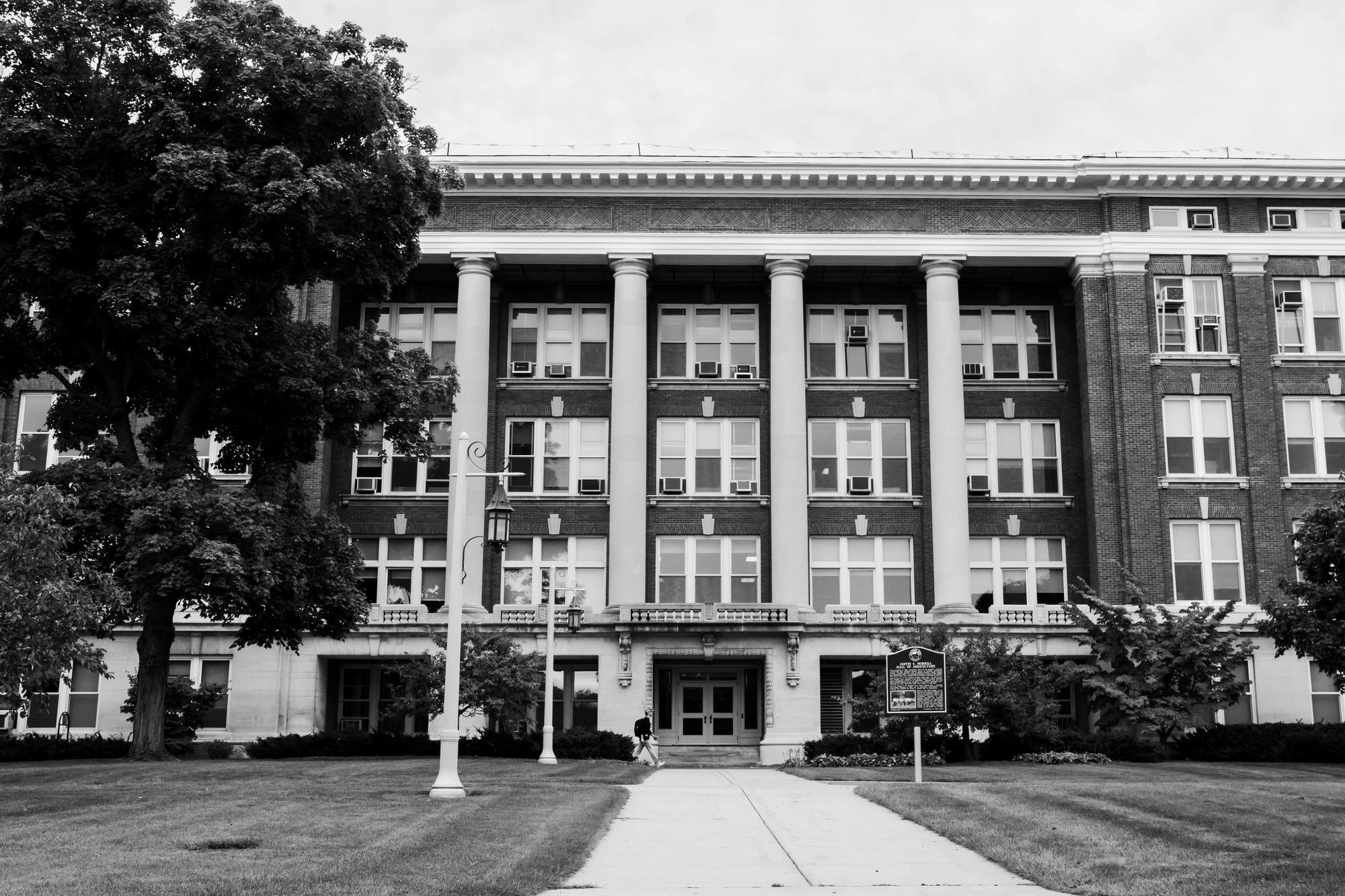 A student walks by the now-closed Morrill Hall of Agriculture building on Sept. 26, 2024.