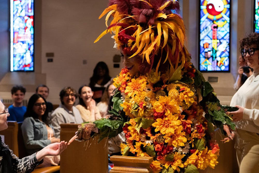 <p>Anna Alicia, whose stage name is Cocoa Caliente, is a local drag artist. She performed for students and visitors at the Alumni Memorial Chapel on April 13.</p>