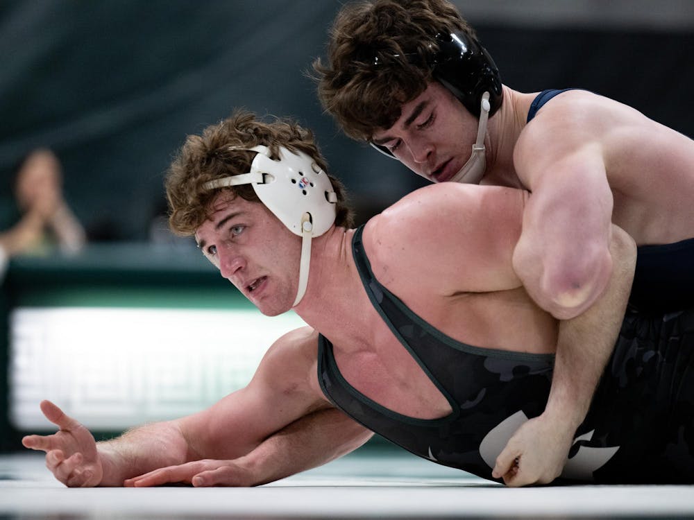 <p>Illinois’ Colin Kelly (174) secures a pin over Michigan State’s Connor O’Neill (174) during their bout as the Spartans fall to the Fighting Illini at Jenison Field House in East Lansing on Friday, Jan. 16, 2026.</p>