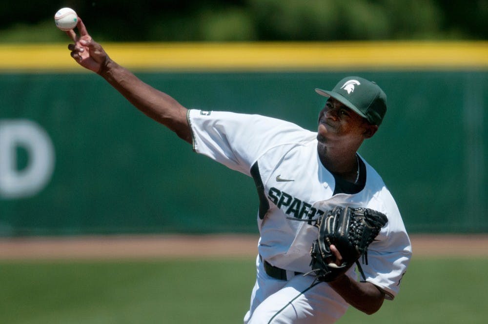 Sophomore pitcher David Garner pitches the ball during the game against Penn State on May 19, 2012 at McLane Baseball Stadium at Old College Field. The Spartans beat Penn State 9-2. Julia Nagy/The State News