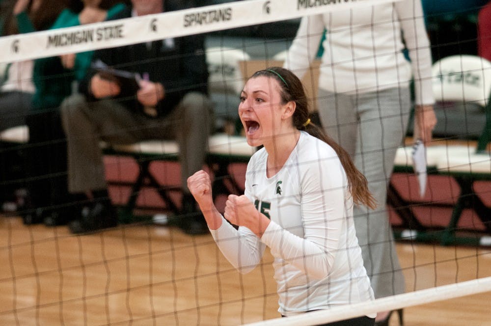 	<p>Senior outside hitter Lauren Wicinski cheers Nov. 1, 2013, during the game against Ohio State at Jenison Field House. The Spartans defeated the Buckeyes, 3-0. Julia Nagy/The State News </p>