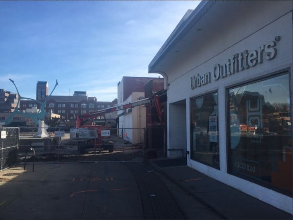 Demolition begins on buildings on Grand River Avenue to make way for the Center City District project.