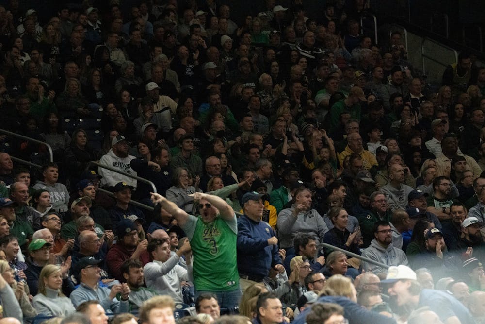 <p>Notre Dame fans celebrating during the Notre Dame v. MSU game held at the Joyce Center on November 30, 2022. The Spartans lost to the Fighting Irish 52 -70.</p>