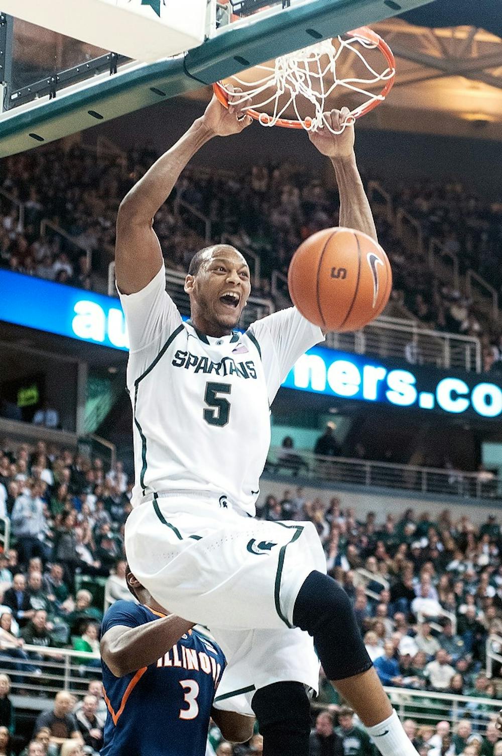 	<p>Junior center Adreian Payne dunks Jan. 31, 2013, during the game against Illinois at Breslin Center. The Spartans defeated the Fighting Illini 80-75. Julia Nagy/The State News</p>