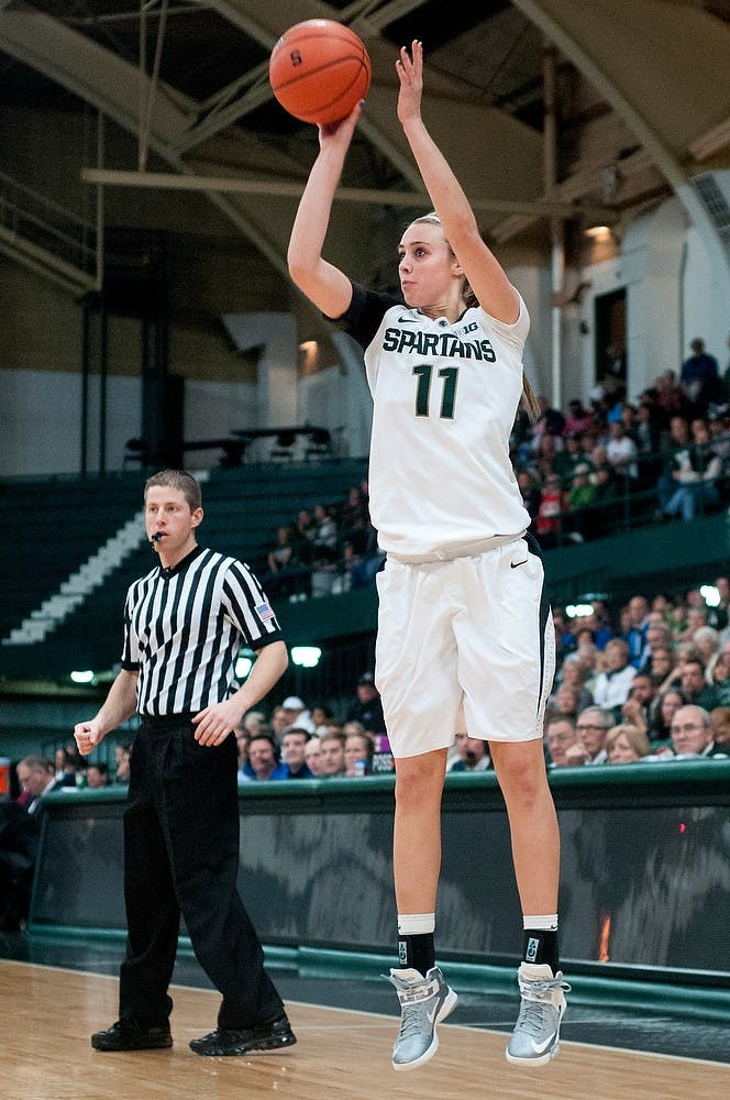 	<p>Junior forward Annalise Pickrel attempts a 3-point field goal. She contributed 15 points for <span class="caps">MSU</span> as the Spartans defeated <span class="caps">IPFW</span>, 64-36, Sunday, Dec. 16, 2012, at Jenison Field House. Justin Wan/The State News</p>