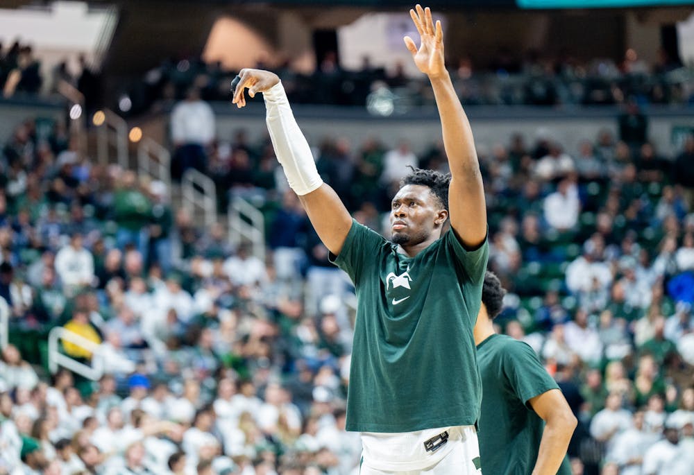 Junior center Mady Sissoko (22) warms up before second half during a game against Villanova at the Breslin Center on Nov. 18, 2022. The Spartans defeated the Wildcats 73-71. 