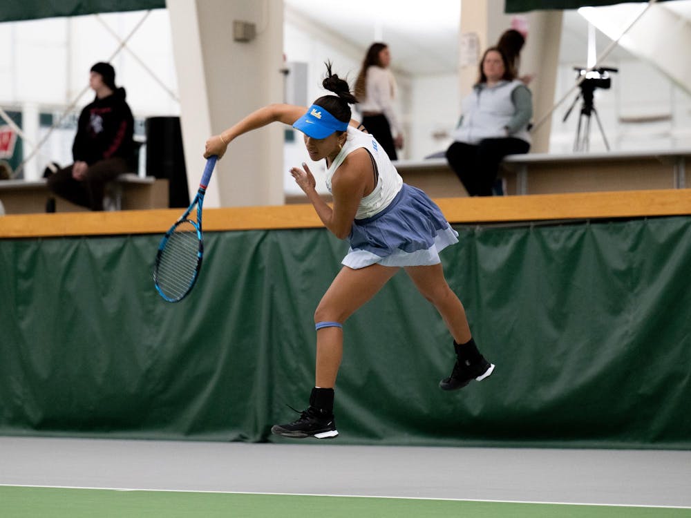 UCLA's Ahmani Guichard (junior) serves during a match at the MSU Tennis Complex on Sunday, Mar. 22, 2026.