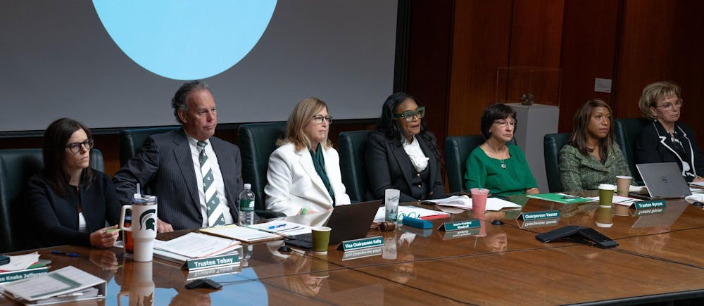 The MSU Board of Trustees listen to a speech during a MSU Board of Trustee's meeting in East Lansing, Mich., Feb. 2, 2024. The Board of Trustees fielded comments from the public, including the divestment of the university's assets from Israel.