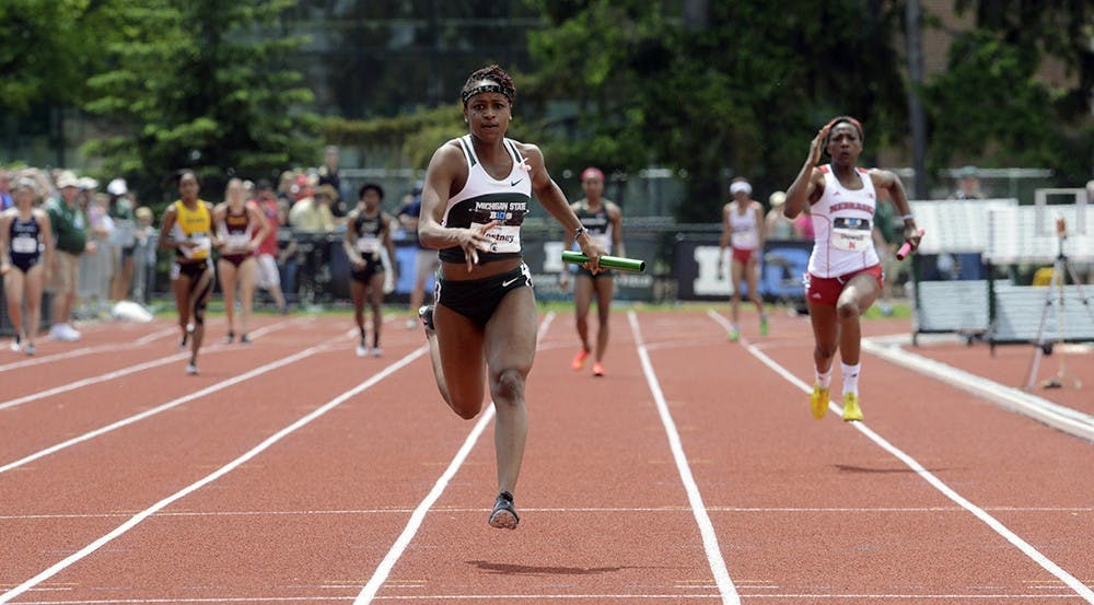 <p>Senior Jellisa Westney nears the finish line during the women's 400 meter relay competition at the Big Ten Conference Championships May 17th, 2015 at Ralph Young Field. Wyatt Giangrande/ State News</p>