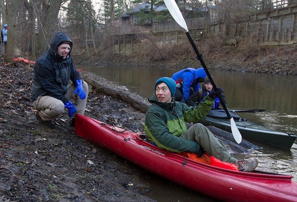 <p>Lansing Community College junior Piet Braun and biochemistry junior Keenan Noyes prepare for their second attempt to reach Michigan's coast April 10, 2015, at the start of the race at Wonch Park in Meridian Township. The two made it to Portland, Mich. before dropping out. Simon Schuster/The State News</p>