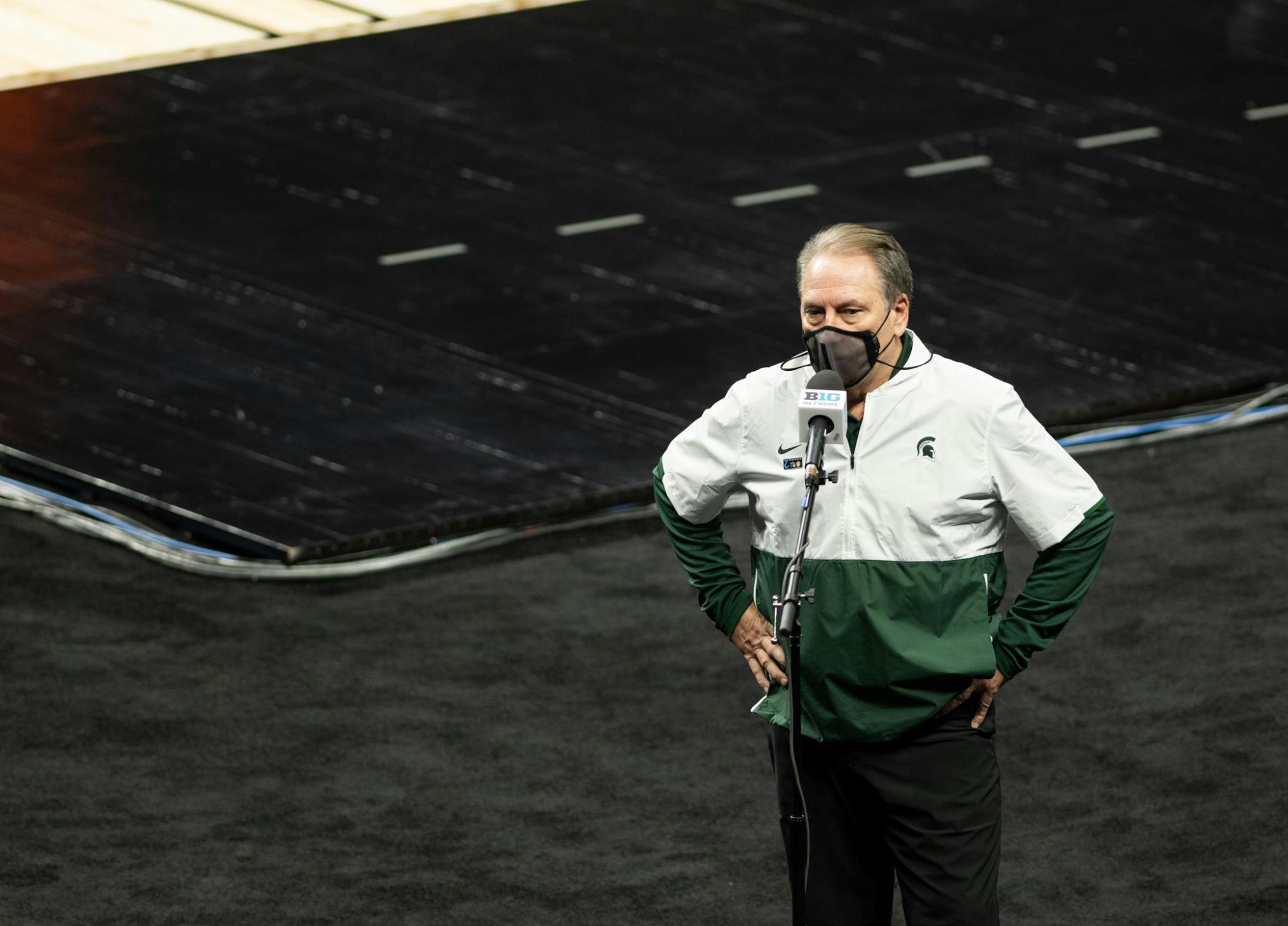 <p>MSU Head Coach Tom Izzo participates in a short interview during halftime in the Big Ten basketball tournament during the game against Maryland on March 11, 2020.</p>