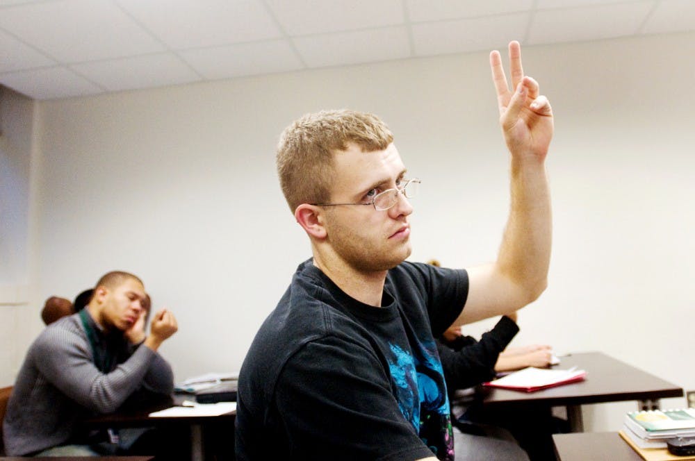 Computer engineering freshman Justin McAdams asks a question in Prep for College Writing class Wednesday morning in Berkey Hall. McAdams, 23, spent four years in the military before coming to MSU. Matt Radick/The State News