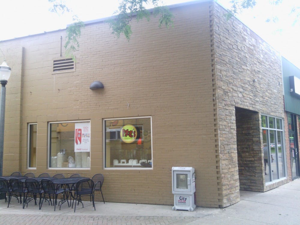 <p>The view outside the now closed Moe's Southwest Grill on Grand River Ave. on June 30, 2015. Ryan Squanda/The State News</p>