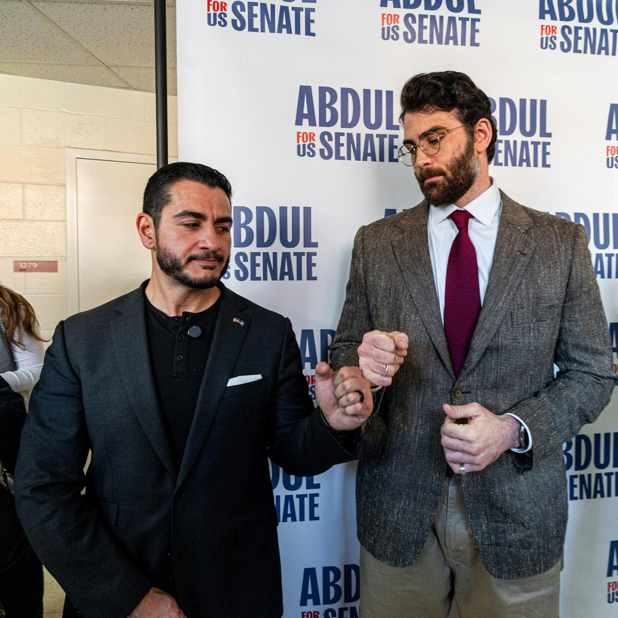 Abdul El-Sayed fist bumps popular leftist commentator, Hasan Piker after his rally at Michigan State University in Anthony Hall in East Lansing, MI on April 7, 2026.