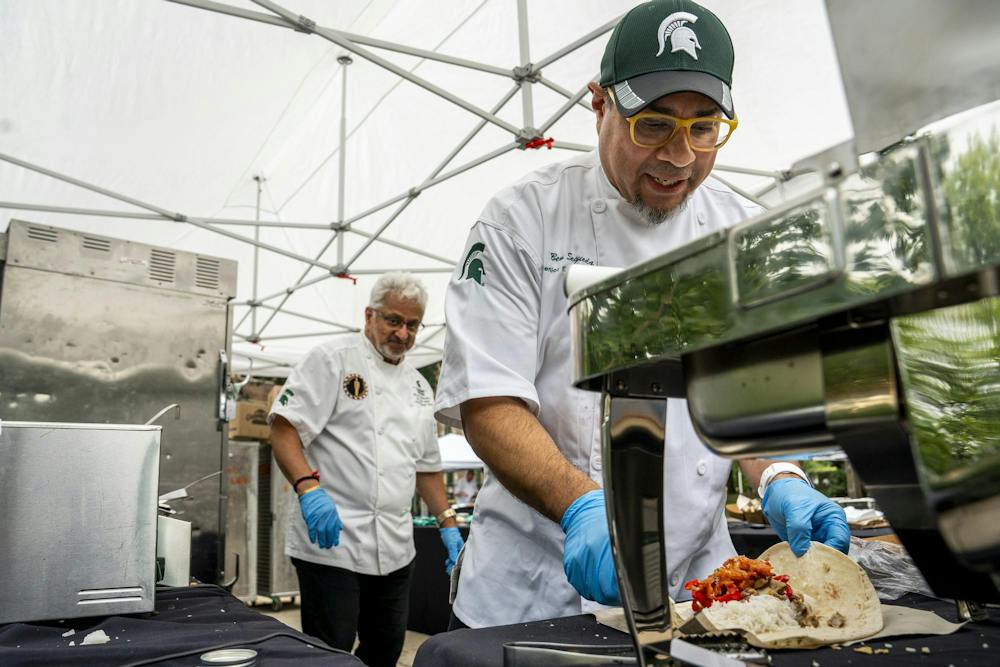 <p>MSU Culinary Services Senior Executive Chef of Retail Dining Ben Segueda prepares a burrito for a student in the MSU Union courtyard in East Lansing, Mich., on Wednesday, Sept. 16, 2026.</p>
