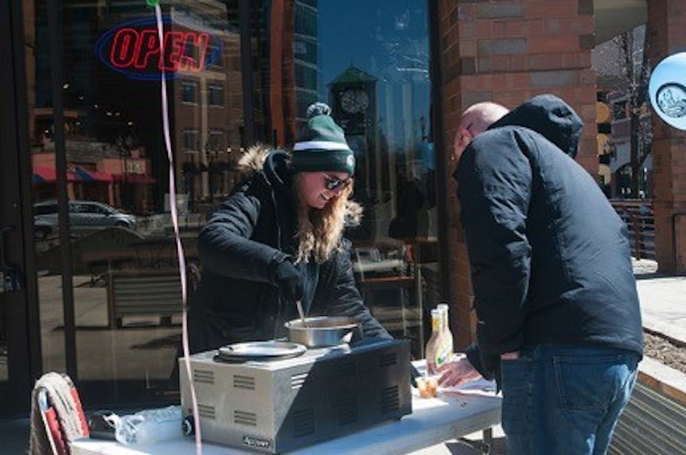 <p>Serving up delicious chili at 2016's event</p>