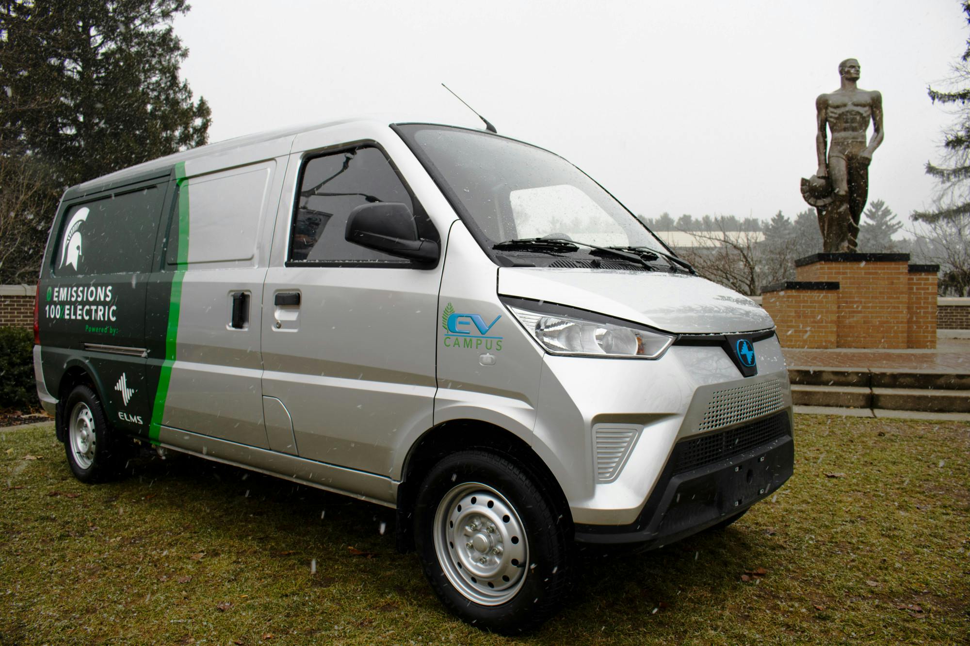 <p>The new all-electric van arrives on campus on Monday, Dec. 6. The vehicle is specially wrapped with the MSU logo. Photo courtesy of the Electric Last Mile Solutions.</p>