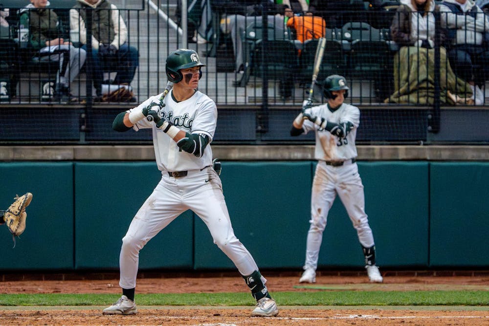 Michigan State third baseman CJ Deckinga, 13, prepares for his first at-bat during Michigan State’s game against Michigan at Jeff Ishbia Field at McLane Stadium in East Lansing, Mich., on Friday, April 10, 2026.