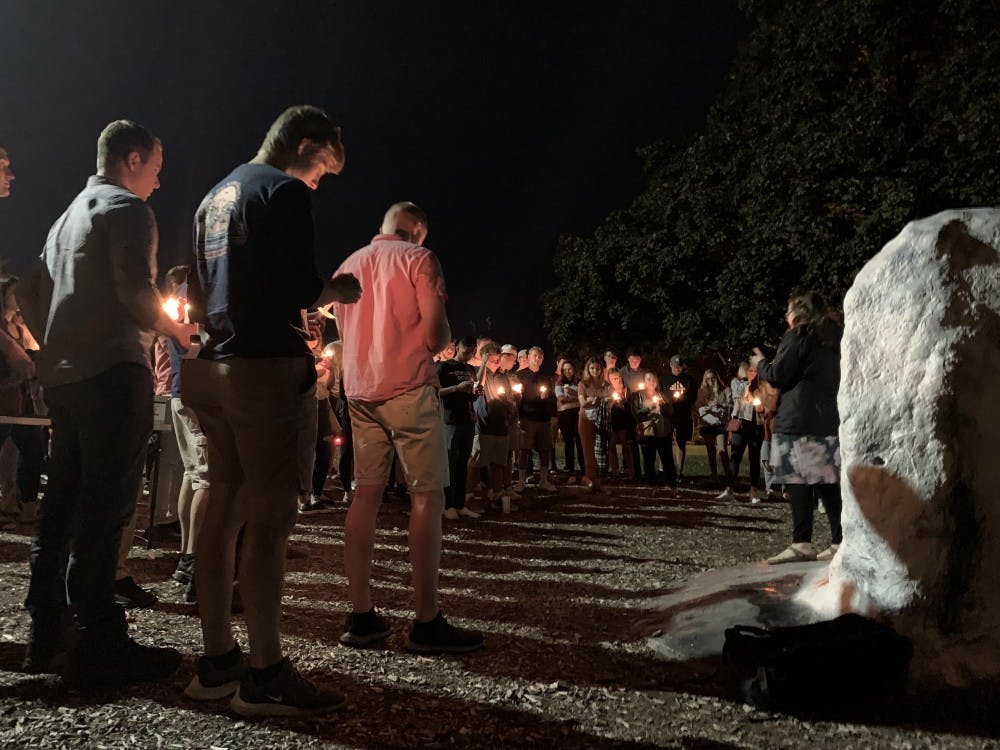 <p>Students attend a candlelight vigil for 2018 MSU graduate Jeremy Swiatek on Wednesday, Sept. 18.</p>