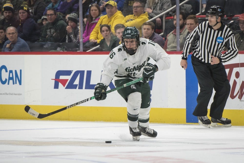 <p>Senior forward Brody Stevens (16) handles the puck during the Duel in the D at Little Caesars Arena in Detroit on Feb. 9, 2019. Nic Antaya/The State News</p>