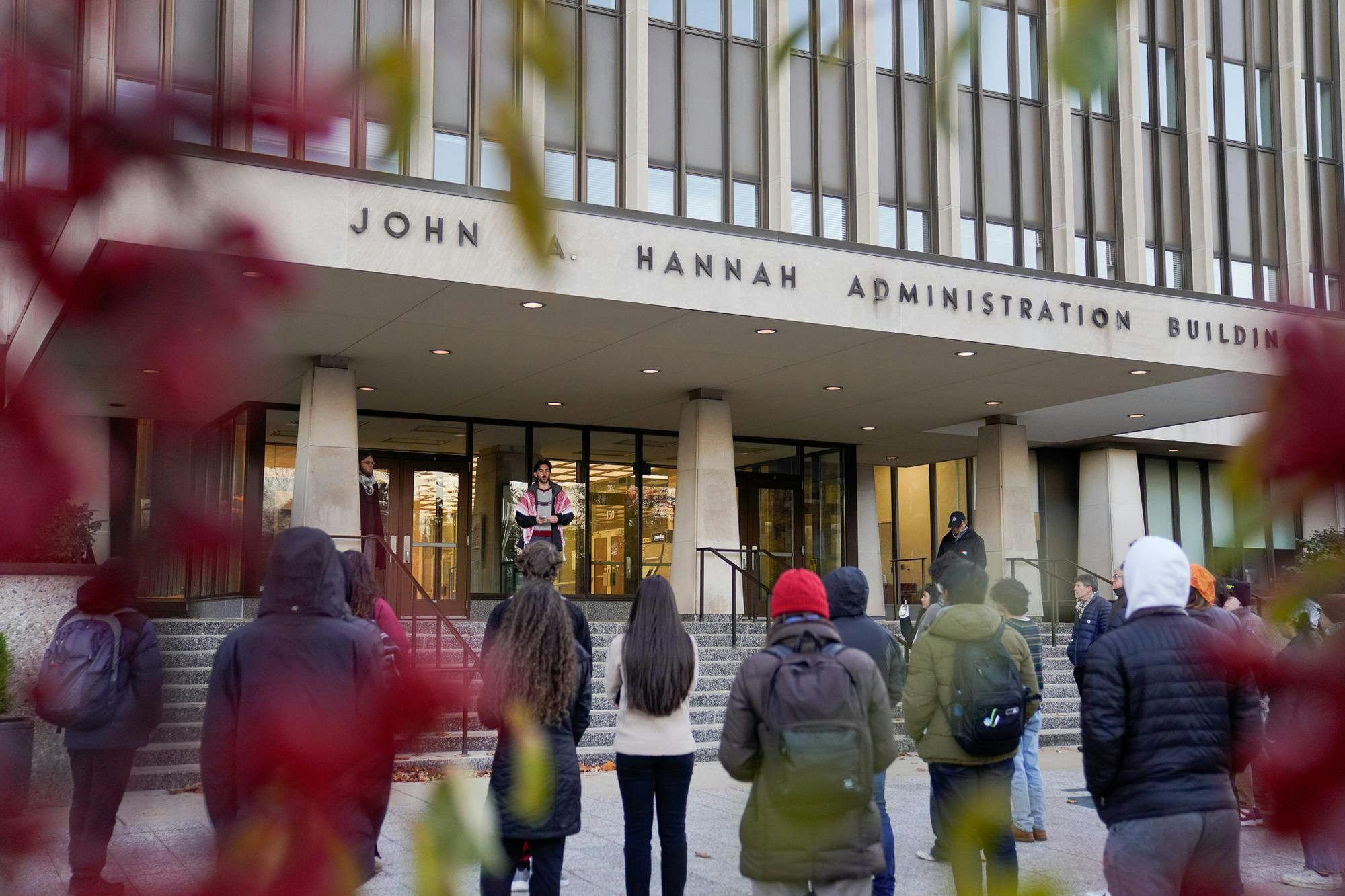 <p>Community members gather to hear from linguistics senior Samir Levitt, other students and professors supporting Palestinians in the Israel-Hamas war at Hannah Administration Building on the evening of Nov. 9, 2023. Students urged administration to declare support for Palestinians.</p>