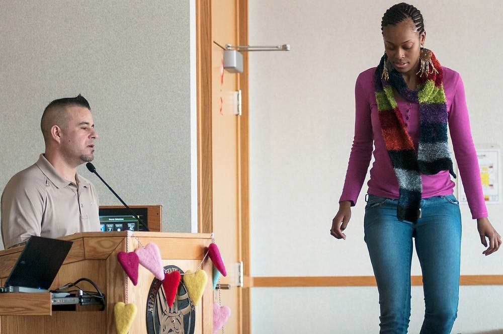 	<p>Lansing area fitness instructor Paul Nagel and Law student Gabrielle Boyer demonstrating exercises that can be performed in under five minutes during &#8220;mindfulness thursdays,&#8221; on Thursday, in the Law College Building. Nagel emphasized the importance of exercise in relieving and coping with stress. Casey Hull/The State News</p>