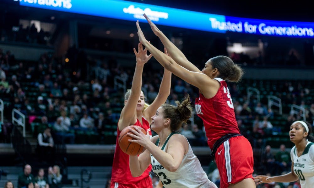 Senior center Jenna Allen shoots a layup against Ohio State. The Spartans lost to the Buckeyes, 70-77, on Feb. 21, 2019 at the Breslin Center.