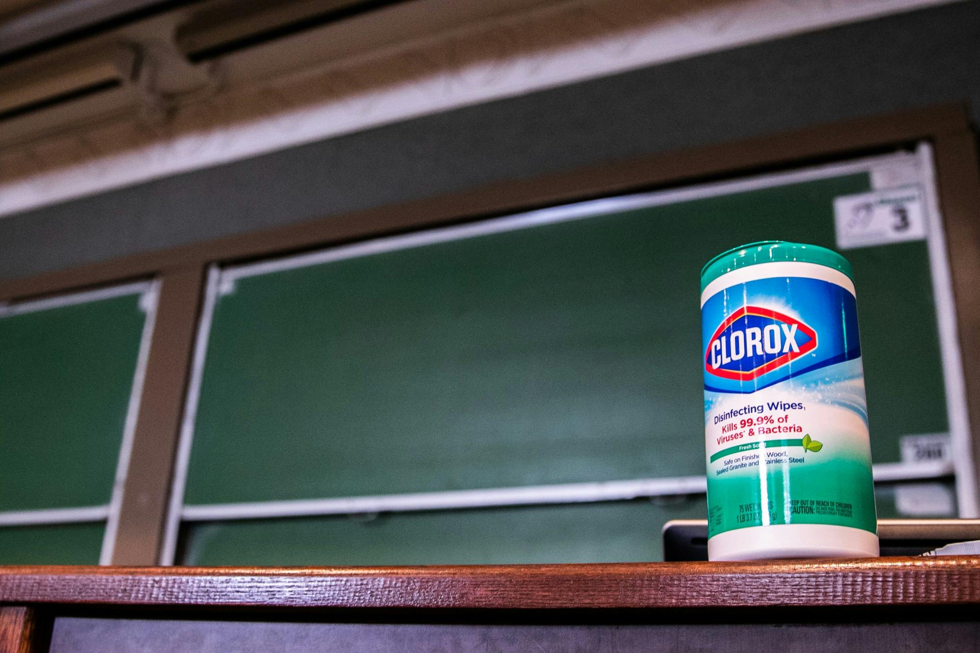 <p>A tub of disinfectant wipes are pictured in an empty Kedzie Hall classroom after MSU canceled classes due to coronavirus March 11, 2020.</p>