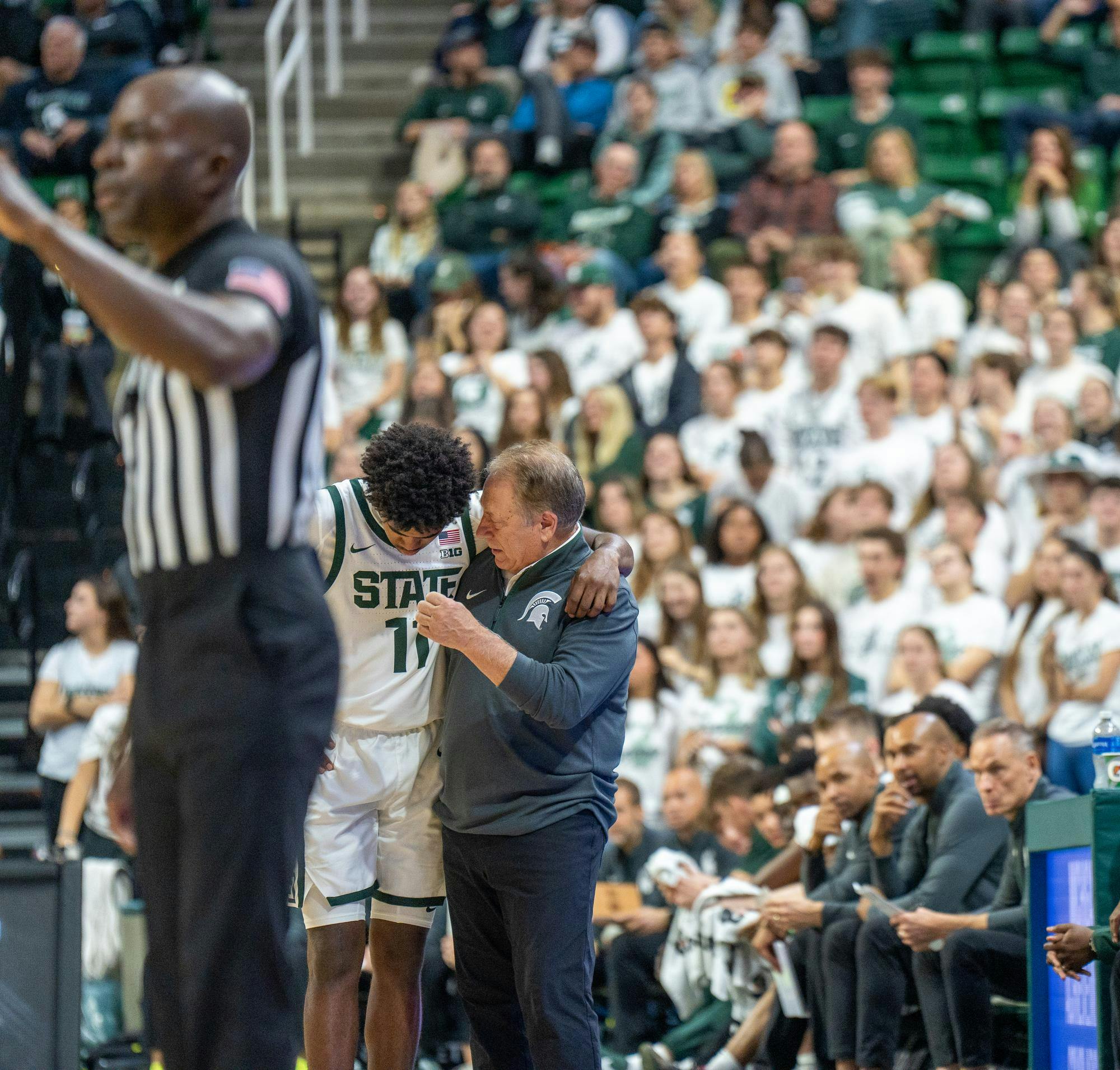 <p>MSU men’s basketball head coach Tom Izzo chats with junior guard Jase Richardson (11) during their game against Monmouth University at the Breslin Center on Nov. 4, 2024.</p>