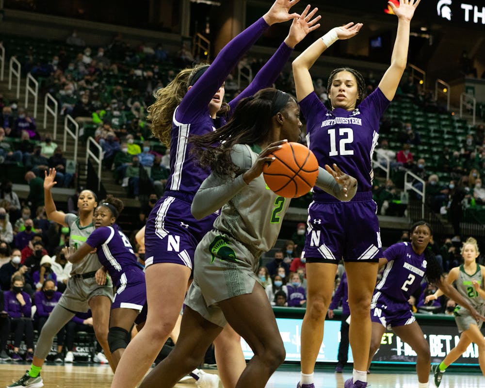 <p>The Northwestern Women’s Basketball defense attempts to box in Graduate Student Forward for Michigan State Tamara Farquhar during the Spartans&#x27; 65-46 win against Northwestern on Jan. 16, 2022. </p>