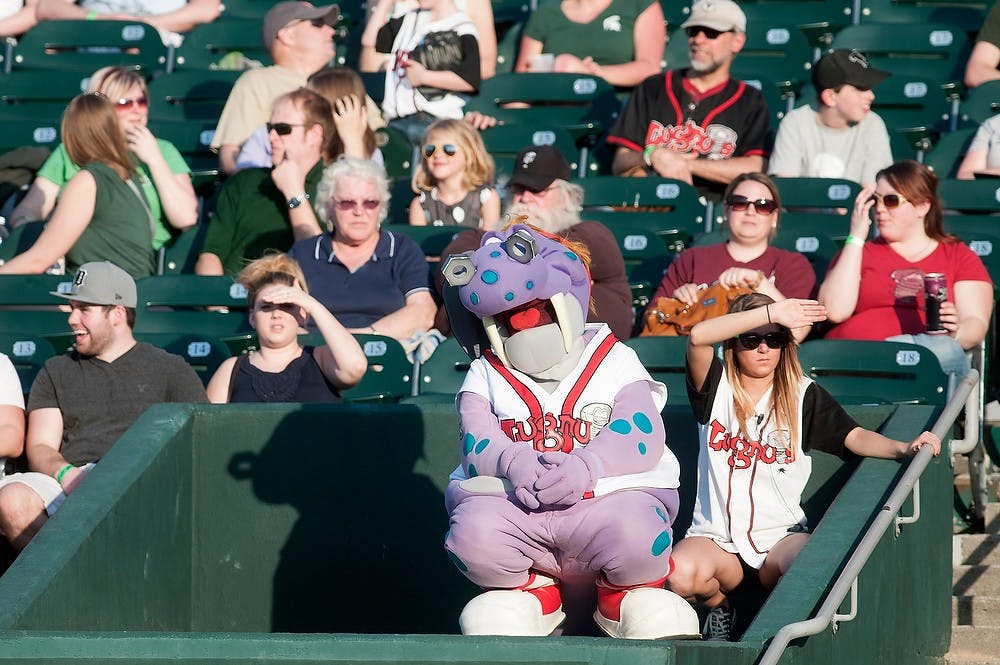 	<p>Big Lug sits with fans during the seventh annual Crosstown Showdown on May 1, 2013, at the Cooley Law School Stadium in Lansing. The Spartans lost to the Lugnuts 10-2. Julia Nagy/The State News</p>