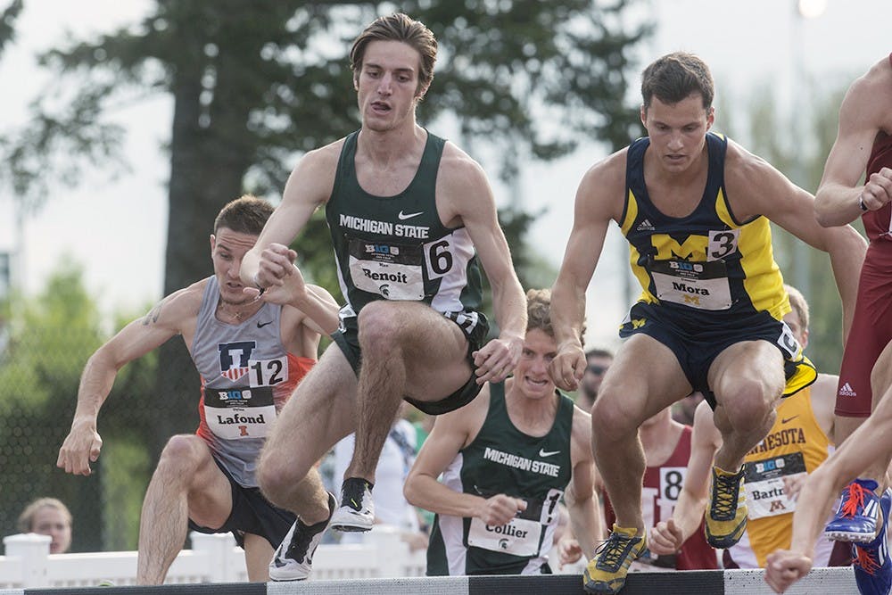 <p>Freshman Max Benoit competes in the men's steeplechase competition during the Big Ten Conference Championships May 16, 2015 at Ralph Young Field. Wyatt Giangrande/ State News</p>
