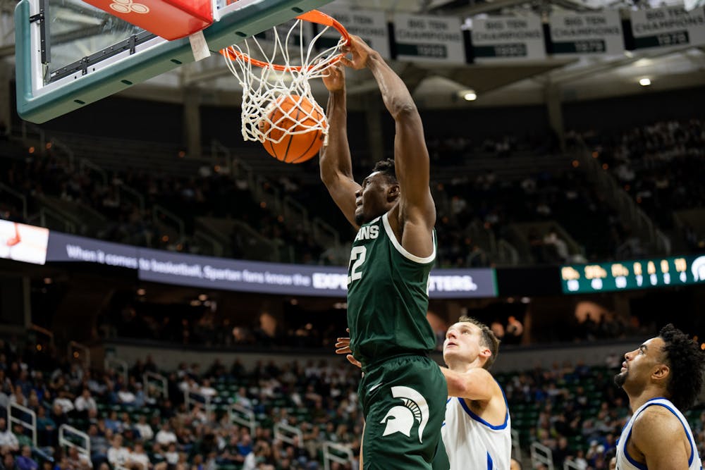 <p>Junior center Mady Sissoko throws down an alley-oop dunk during Michigan State men&#x27;s basketball&#x27;s exhibition match with Grand Valley State on Nov. 1, 2022.</p>