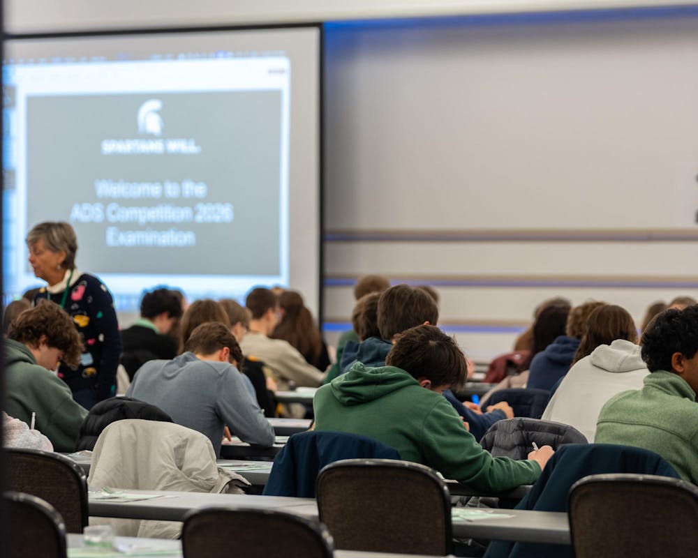 High school students wait for the ADS exam to begin in the Kellogg Hotel and Conference Center in East Lansing, MI on Feb 6, 2026.
