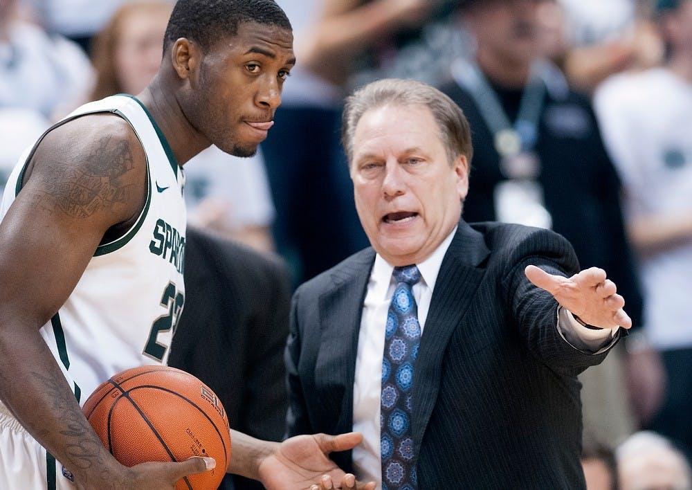 	<p>Head coach Tom Izzo talks with sophomore guard Branden Dawson in the second half of the game. The Spartans defeated the Fighting Illini,, 80-75, Thursday, Jan. 31, 2013, at Breslin Center. Justin Wan/The State News</p>